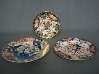 An 18th Century Derby porcelain plate, the base incised Derby  7", a similar Derby plate (cracked) and a Royal Crown Derby plated marked Philips Mount St. London 