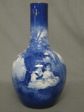 A Royal Doulton blue glazed club shaped vase decorated seated girls beneath a tree 7"