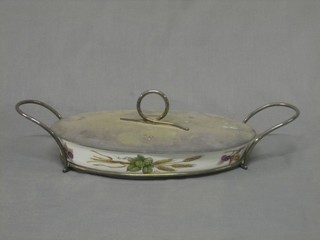 An oval Royal Worcester dish contained in a silver plated mount 13"