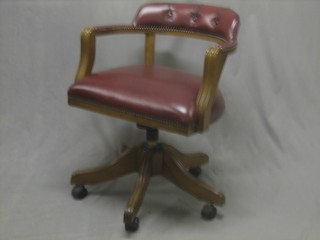 A Georgian style mahogany office swivel chair