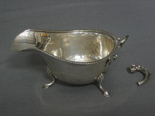 A silver sauce boat with C scroll handle (f)