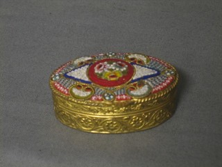 An oval gilt metal pill box with micro mosaic lid 2"