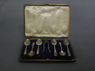 A harlequin set of 6 silver teaspoons together with tongs 2 ozs 