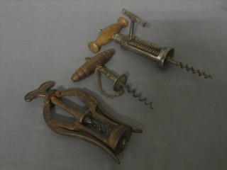 A double action cork screw and 3 other cork screws 