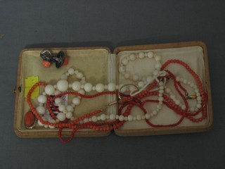 3 coral necklaces, a gold and coral ring, a stick pin and etc