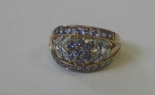 A lady's 9ct gold dress ring set tanzanite and diamonds