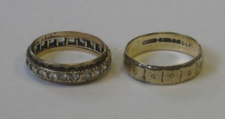 A 9ct gold wedding band and an eternity ring