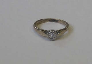 A 9ct gold dress ring set an illusion set diamond