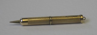 A 9ct gold tooth pick