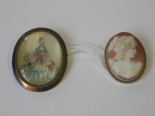 A shell carved cameo portrait brooch and an oval gilt metal brooch