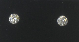 A pair of circular diamond stud earrings set in 18ct gold approx 0.42ct