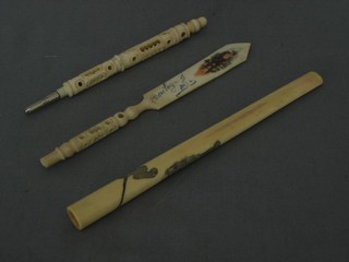 A carved ivory pen, do. paper knife set Stanhopes (f), together with a carved ivory cigarette ivory carved a lion