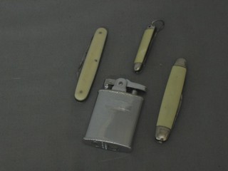 A Ronson lighter and 3 folding pocket knives