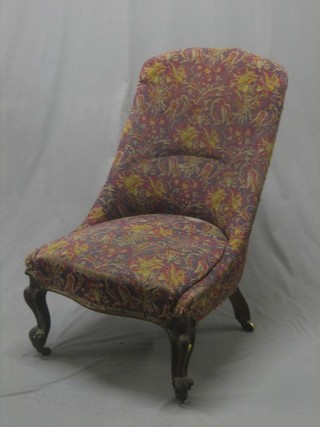 A Victorian iron and mahogany framed chair, raised on cabriole supports