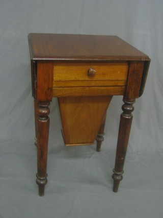 A Victorian mahogany drop flap work table fitted a drawer with long basket, raised on turned supports 19" 