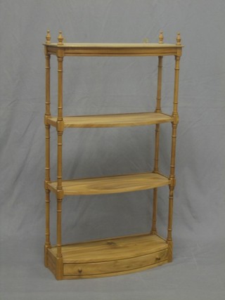 A Georgian style bleached mahogany bow front 4 tier what-not, the base fitted a drawer, raised on turned and block supports 19"