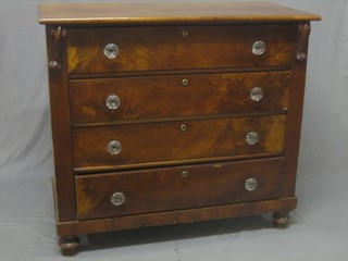 A Victorian mahogany chest of 4 long drawers with glass handles raised on turned supports 44"