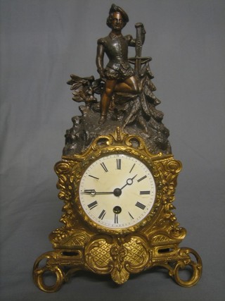 A French 19th Century 8 day clock contained in a spelter case surmounted by an Historical figure 13" 