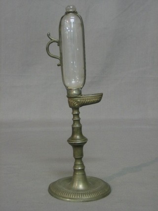 A curious 18th/19th Century Continental glass and pewter oil clock