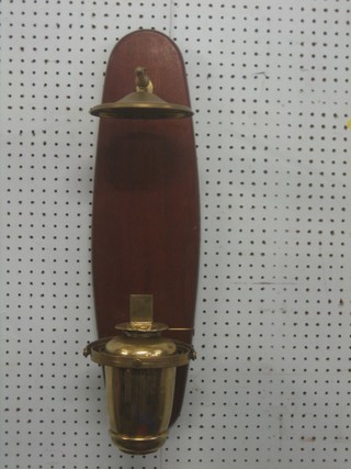 A brass gimbled hanging lantern