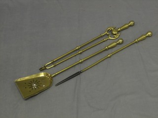 A 19th Century style brass 3 piece fireside companion set with tongs, poker and shovel