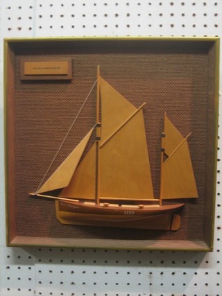 A wooden half mould model of the Brixham Trawler Anni Georgina 13" x 12"