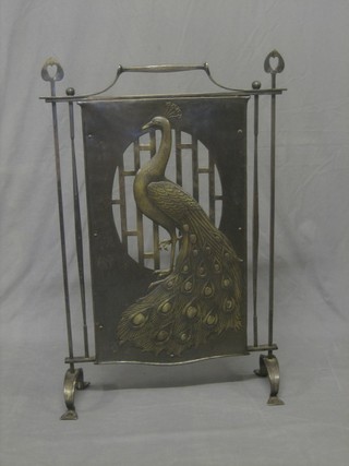 An Art Nouveau pierced and polished steel fire screen decorated a fabulous bird 23" 