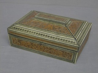 A Huntley & Palmer biscuit tin in the form of a sarcophagus shaped carved wooden box 10"