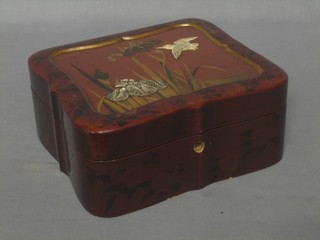 A 19th Century Oriental shaped lacquered trinket box the lid inlaid ivory and mother of pearl decorated birds 8"