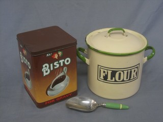 A cylindrical cream enamelled twin handled flour bin lid 8" together with a Bisto gravy tin