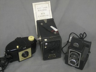 A Mayfair box camera boxed, a Kodak Brownie 127 and a Ross Ensign Ful-vue camera