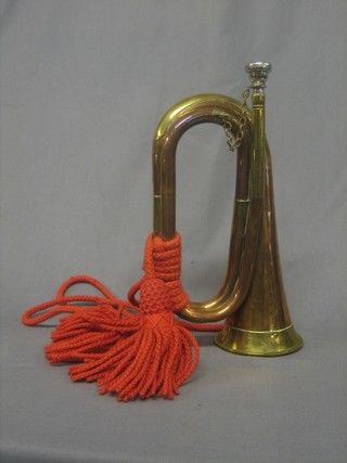 A copper and brass bugle by Potters of Aldershot