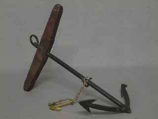 A wooden model of a fisherman's anchor 14"
