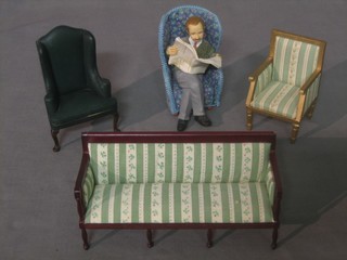A collection of dolls house furniture including sofa and 3 armchairs