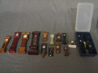 7 various doll house longcase clocks, 3 regulators, bracket clock, globe shaped clock, a cuckoo clock, a barometer and 7 other clocks