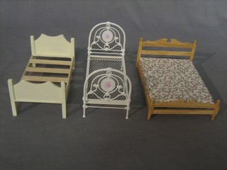 3 various dolls house beds