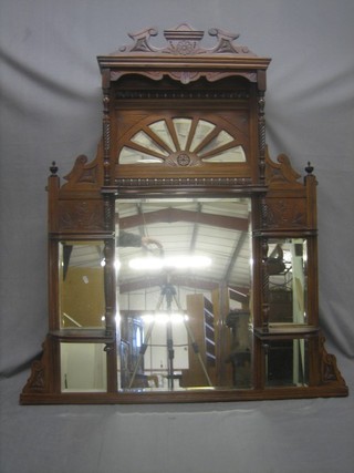 An Edwardian multiple plate over mantel mirror contained in a carved walnut frame 49"