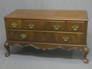 A walnut Queen Anne style chest of 1 long drawer flanked by 2 short drawers, above 1 long drawer, raised on cabriole supports, with Waring & Gillows stamp 45"