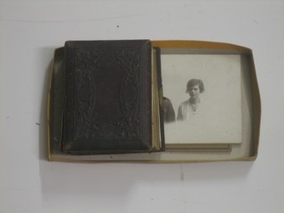 A small Victorian leather bound photograph album 5" together with a collection of early black and white photographs