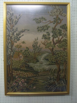A Berlin wool work panel depicting wooded landscape with river and cottage 38" x 26"