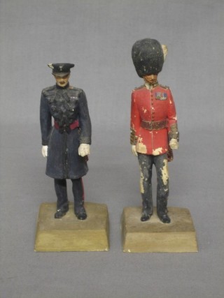 A plaster figure of a standing Welsh Guards Officer 5" and a do. Grenadier guards officer (both f) 