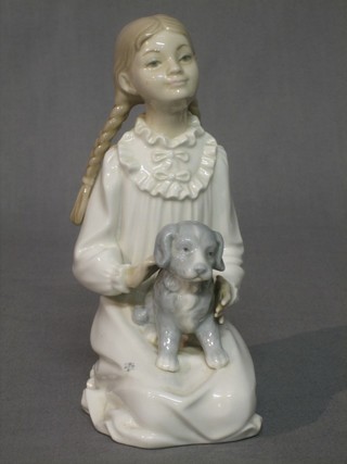 A Nao figure  in the form of a seated girl with puppy dog 7"