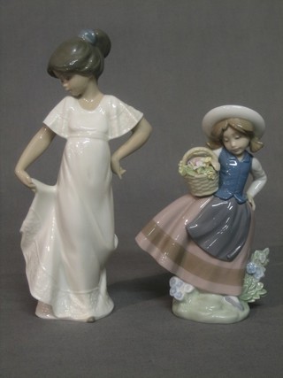 A Lladro figure of a girl with basket of flowers, the base marked 5221 6 1/2" and a Nao figure of a standing girl 8"