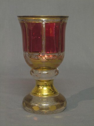 A Bohemian goblet shaped glass vase with red and gilt decoration 7"