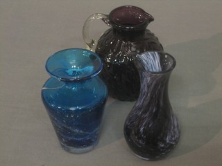 A blue Medina club shaped vase 4", a brown Art Glass jug with clear glass handle 5" and an Art Glass club shaped vase 5"
