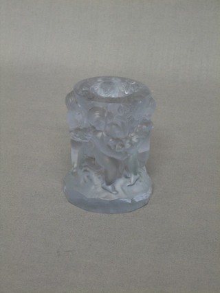 A circular specimen glass vase/candlestick in the form of cherubs with garlands 3"