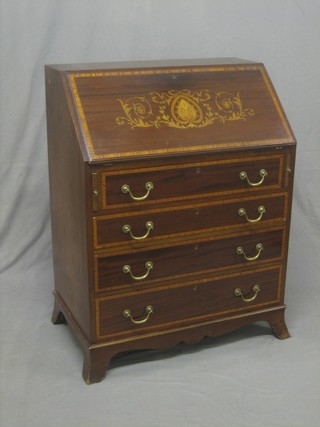 An Edwardian mahogany bureau the heavily inlaid fall front revealing a well fitted interior above 4 long graduated drawers with brass swan neck drop handles, raised on splayed bracket feet 30"