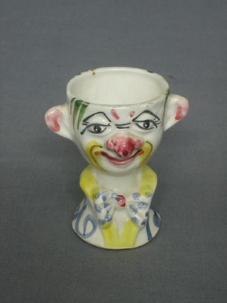 An Italian humerous pottery egg cup 3"