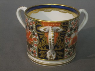 An 18th Century Derby 3 handled loving cup the base with crown crossed swords 3"