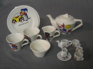 An 8 piece Noddy tea service comprising teapot 3" decorated Big Ears (lid f and r), 3 plates decorated Noddy by his car (1 cracked) 5", 2 cups, cream jug and sugar bowl together with a dolls house tea service (teapot no lid)